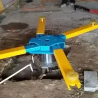 In-ground single post car lift – X shape